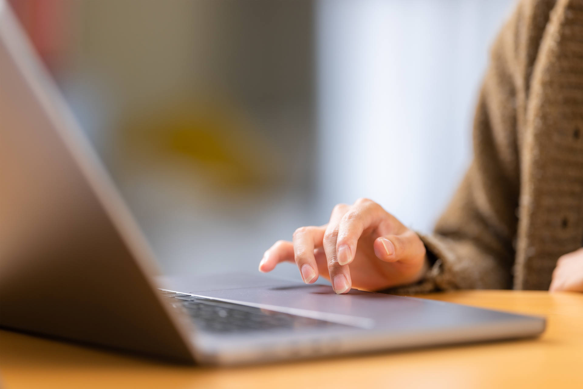 A person using a laptop. 